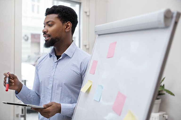 businessman-presenting-his-project-colleagues